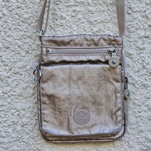 Kipling gold metallic nylon mini crossbody bag